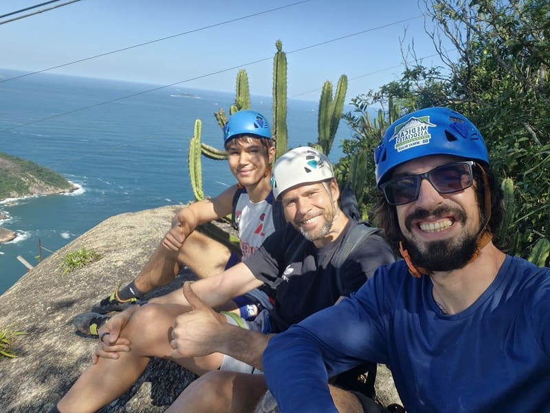 group of men at the top of the sugarloaf mountain Cepi