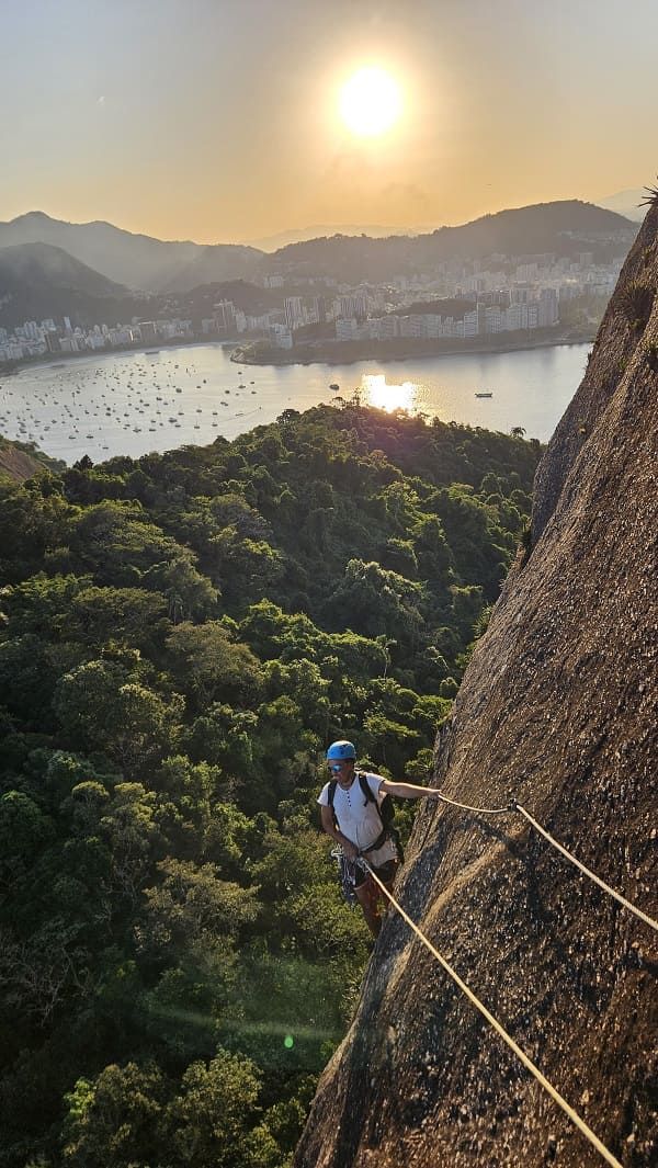 man climbing via ferrata on Sugarloag mountain in Rio de Janeiro 2