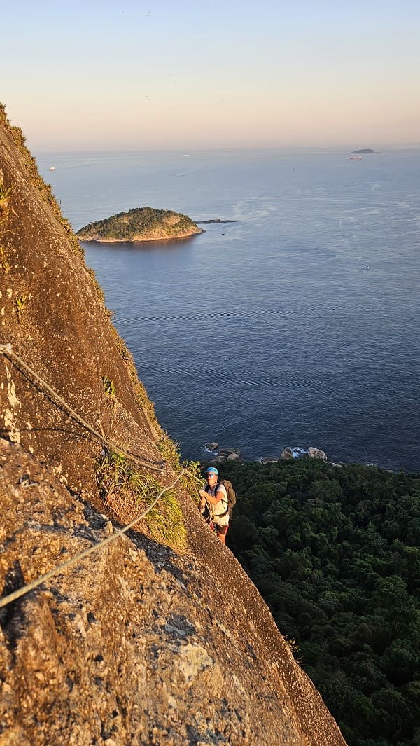 man climbing via ferrata on Sugarloag mountain in Rio de Janeiro 3
