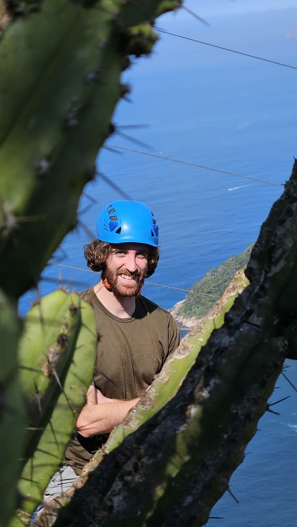man climbing via ferrata on Sugarloag mountain in Rio de Janeiro 4