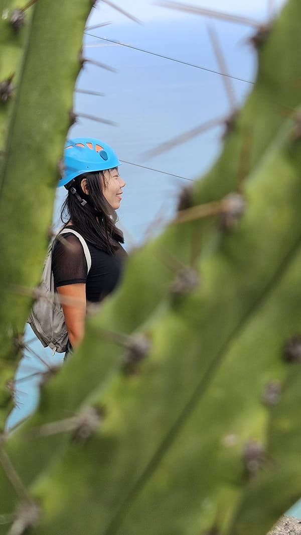 woman climbing via ferrata on Sugarloag mountain in Rio de Janeiro 2